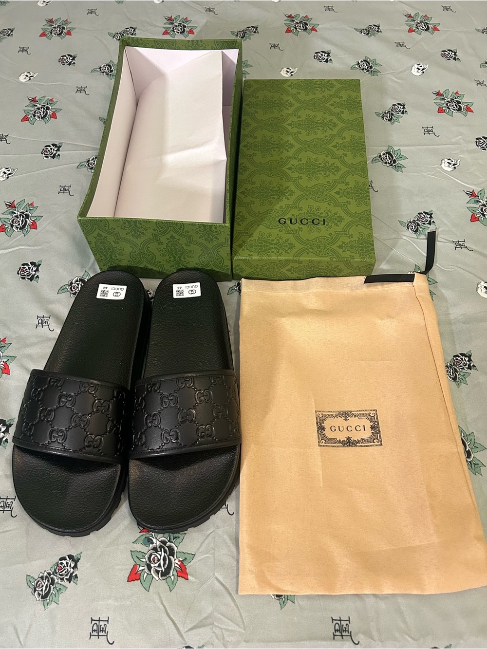 Gucci Black Embossed Logo Slide Sandals